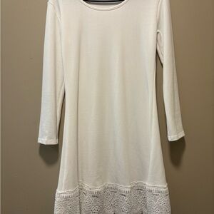 Elegant White Dress with Lace Hem